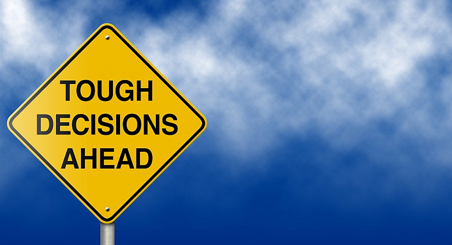 sign: Tough Decisions Ahead