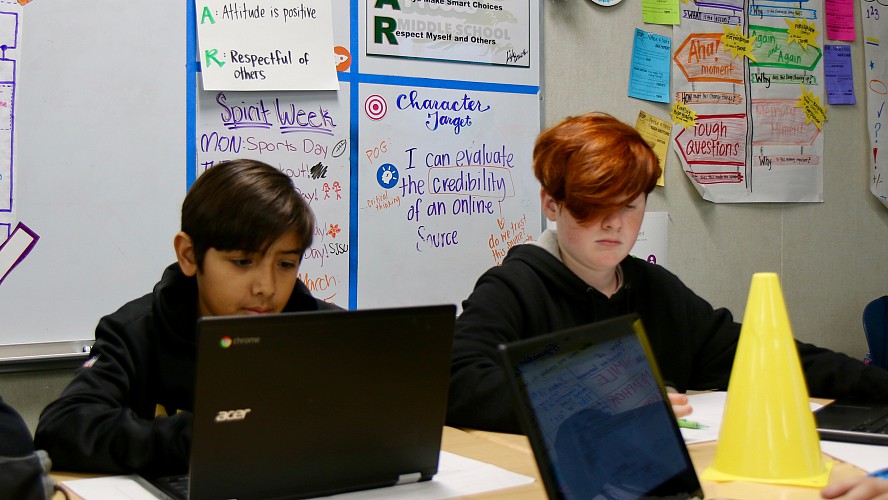 students on laptops