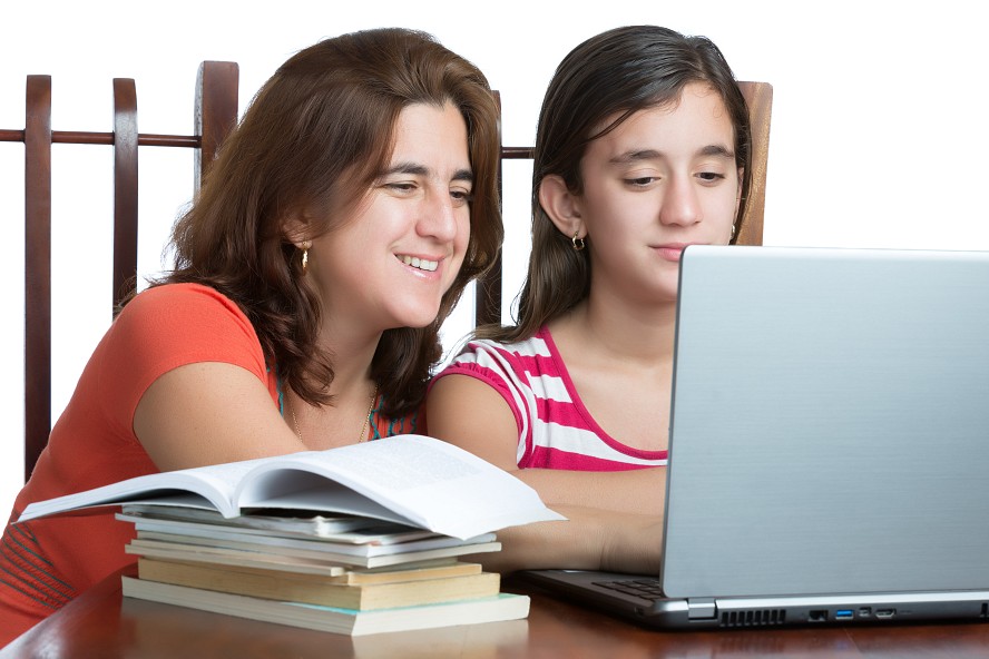 mother and daughter at laptop