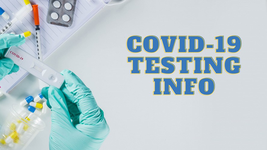 gloved hands hold a COVID-19 testing vial