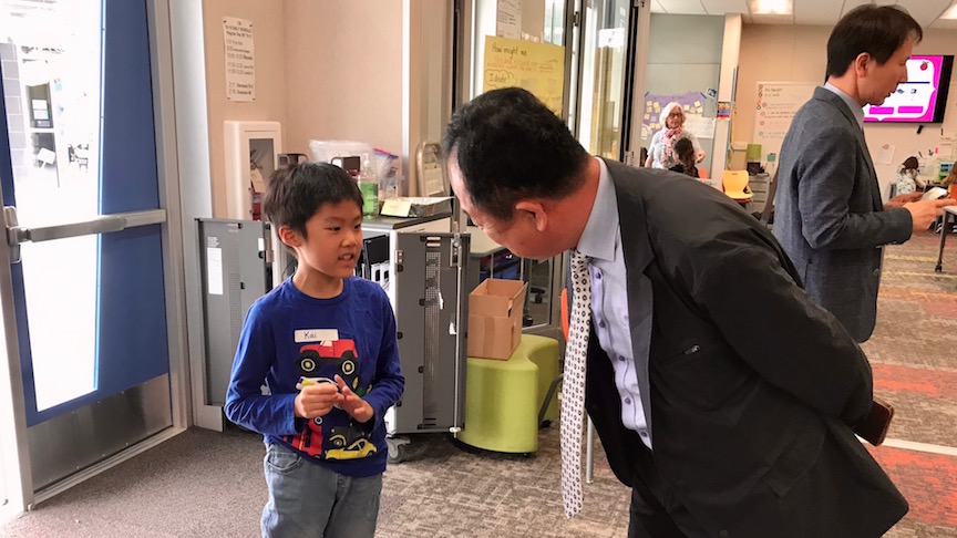 student speaks to school official