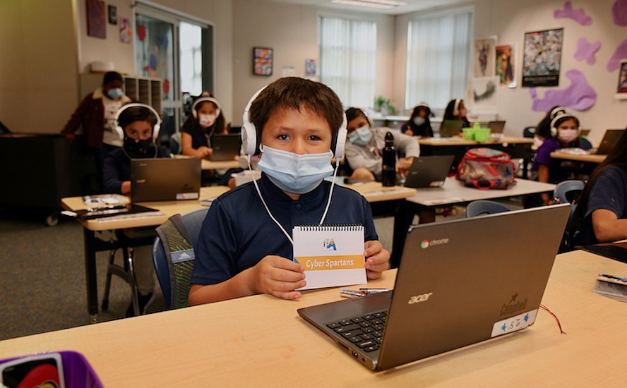 Rosemary CyberSpartan students with laptops