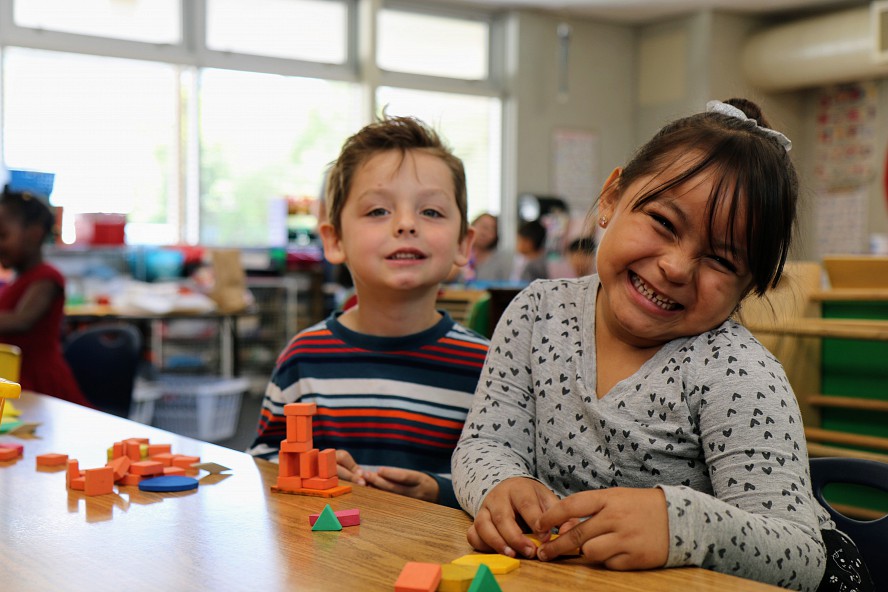 kindergarten boy and girl smiling