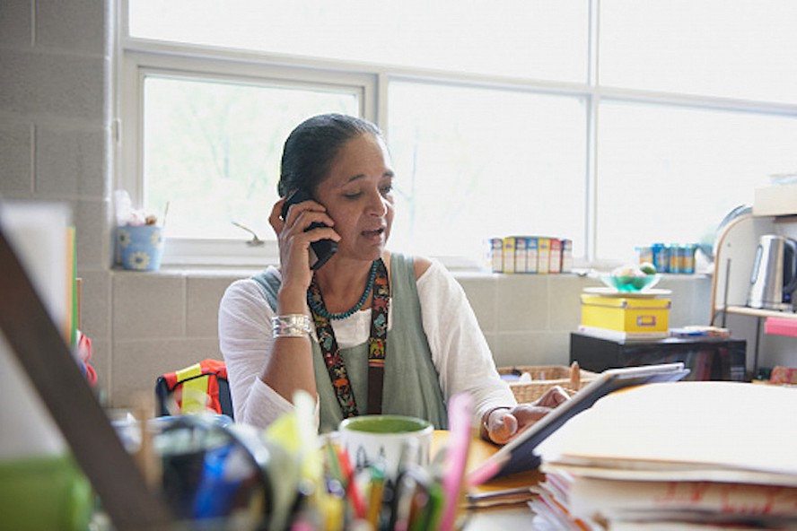 woman teacher talking on phone