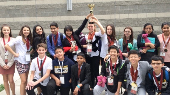 Monroe Middle School's 2018 World Scholars Cup Team with trophy