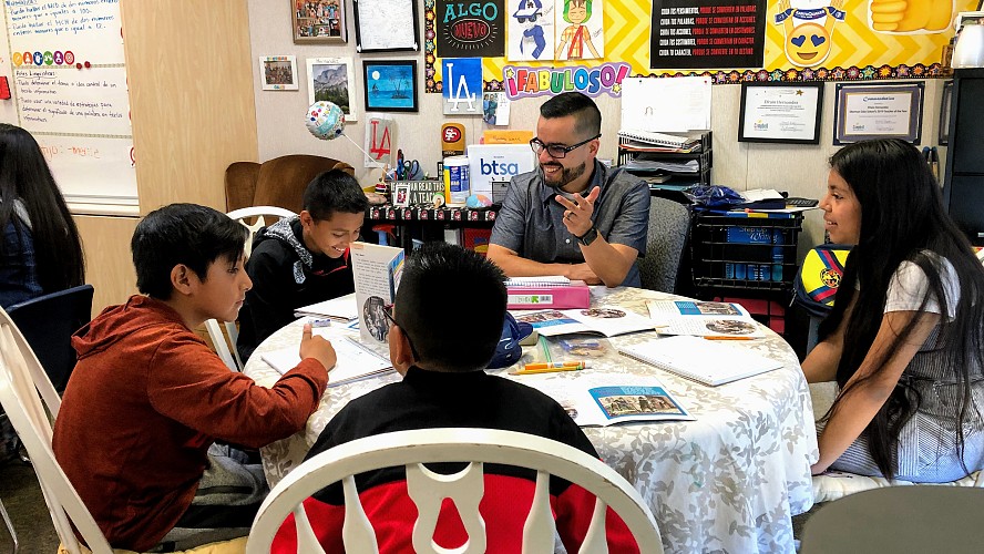 teachers smiles while with students