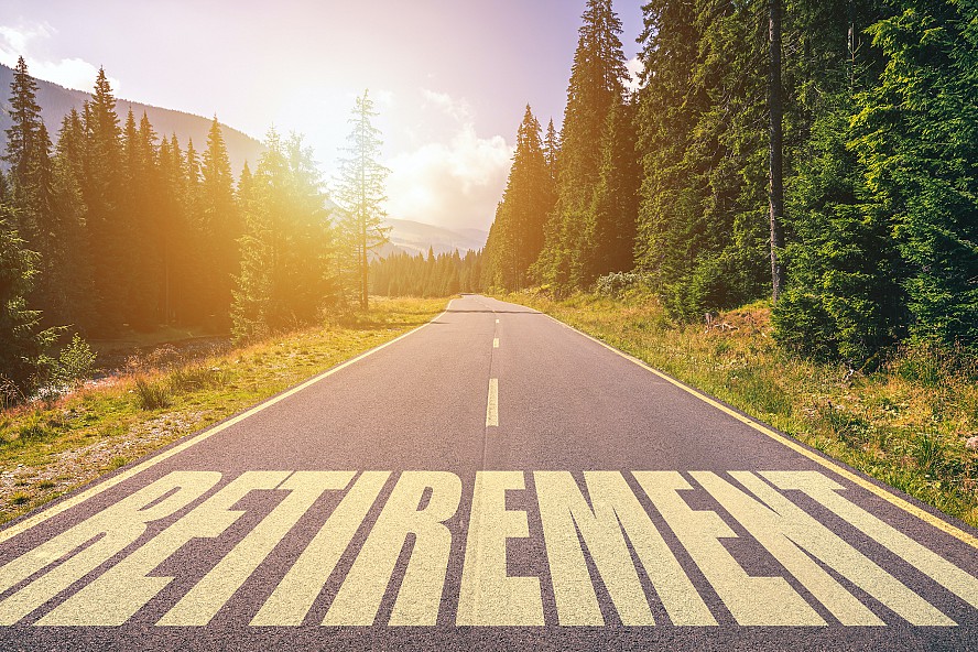 highway with the word retirement on pavement
