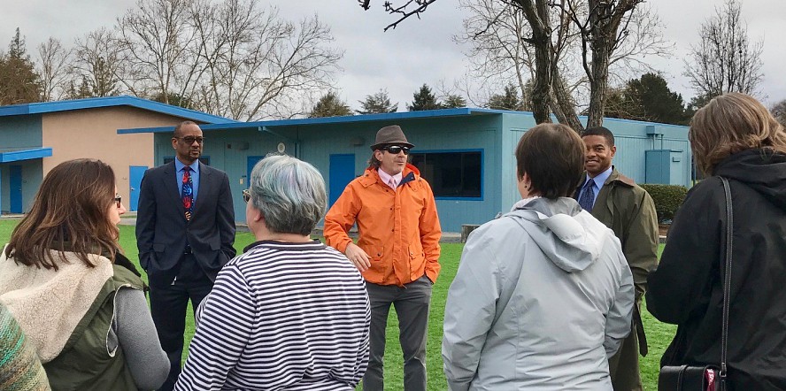 transformation team members touring school campus