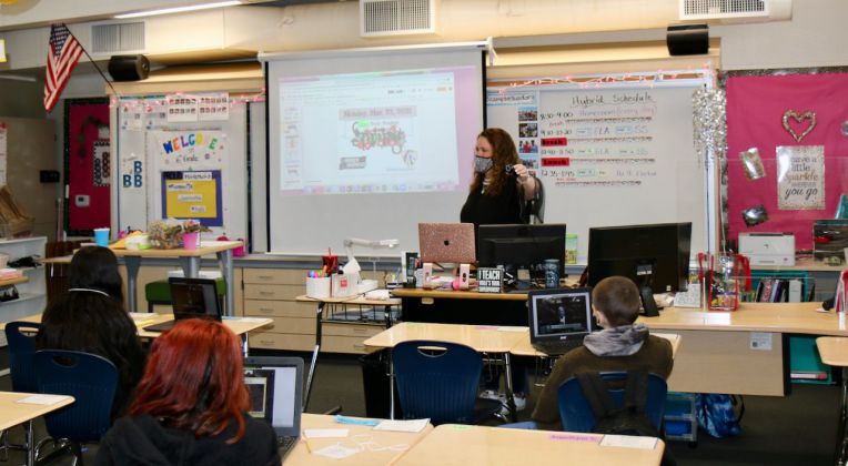 teacher in class with students