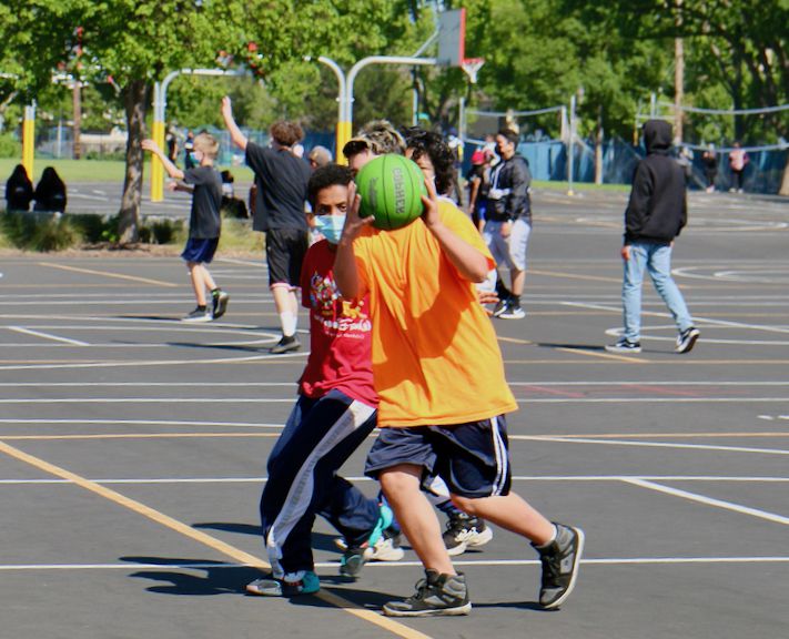 boys playing basketball