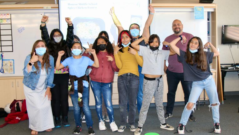 group of students looking proud