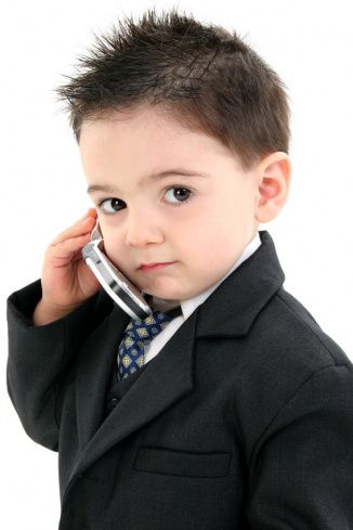 toddler boy with phone