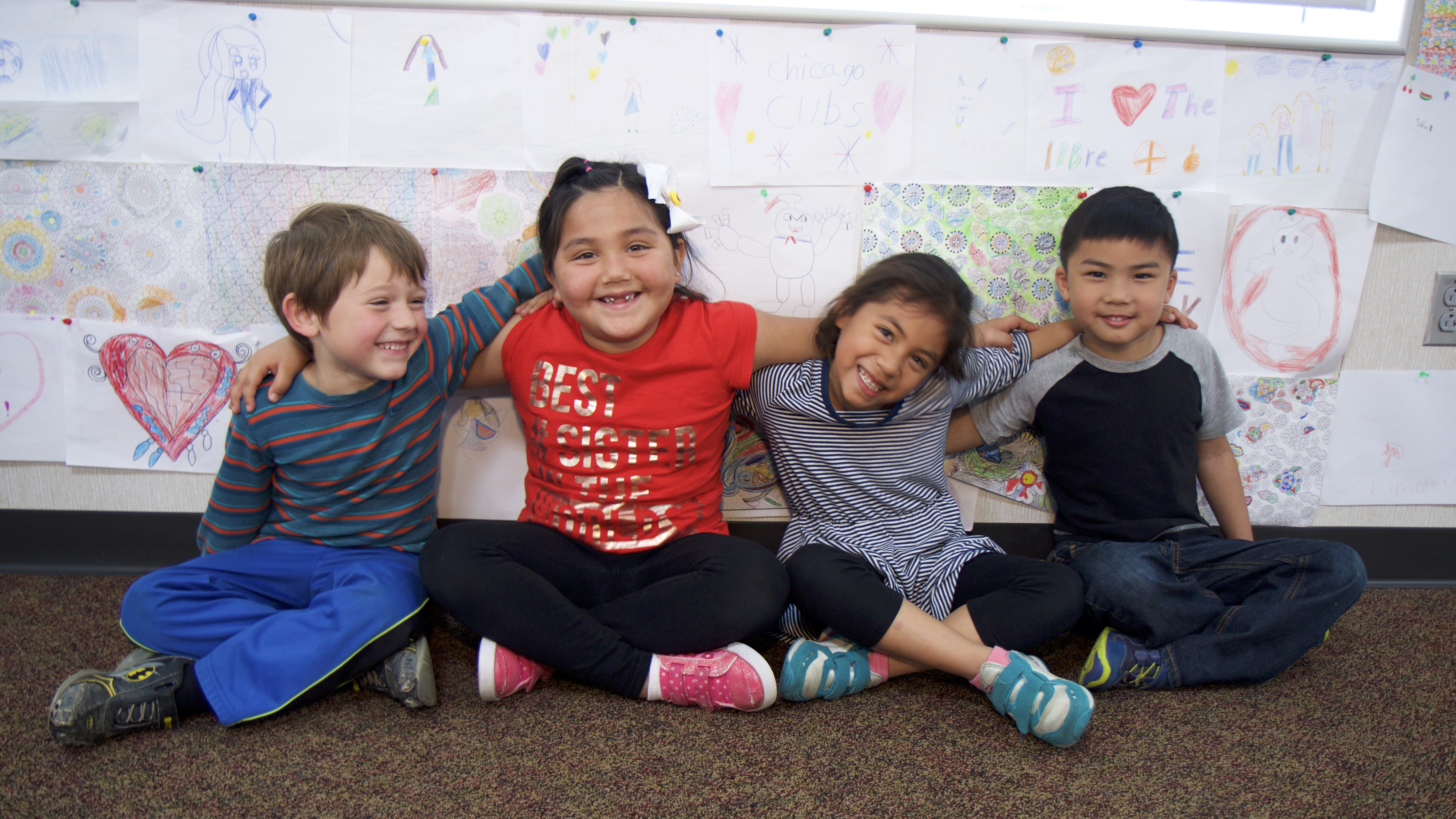 four happy students